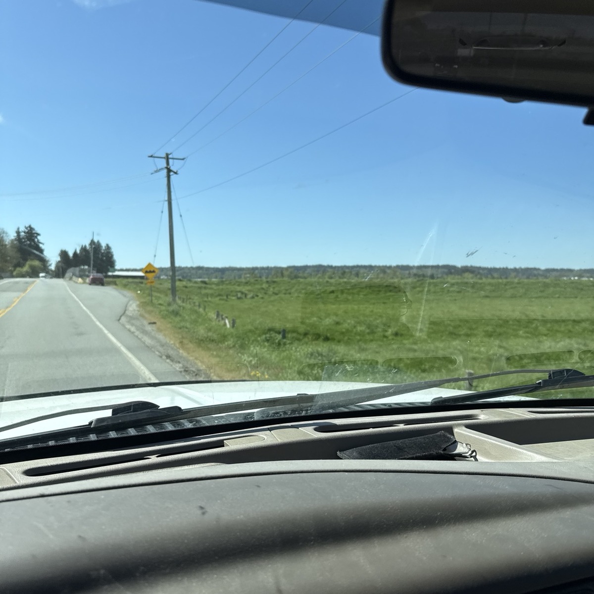 road seen from inside a work truck